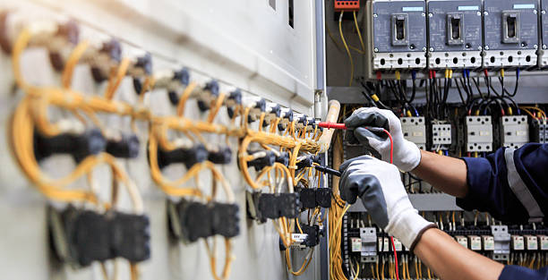 Professional Electrician technician working in St. Helen, MI